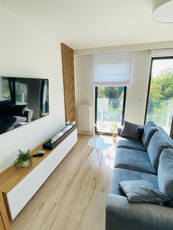 Luxury White Apartment In Park Lotnikow Краков Экстерьер фото